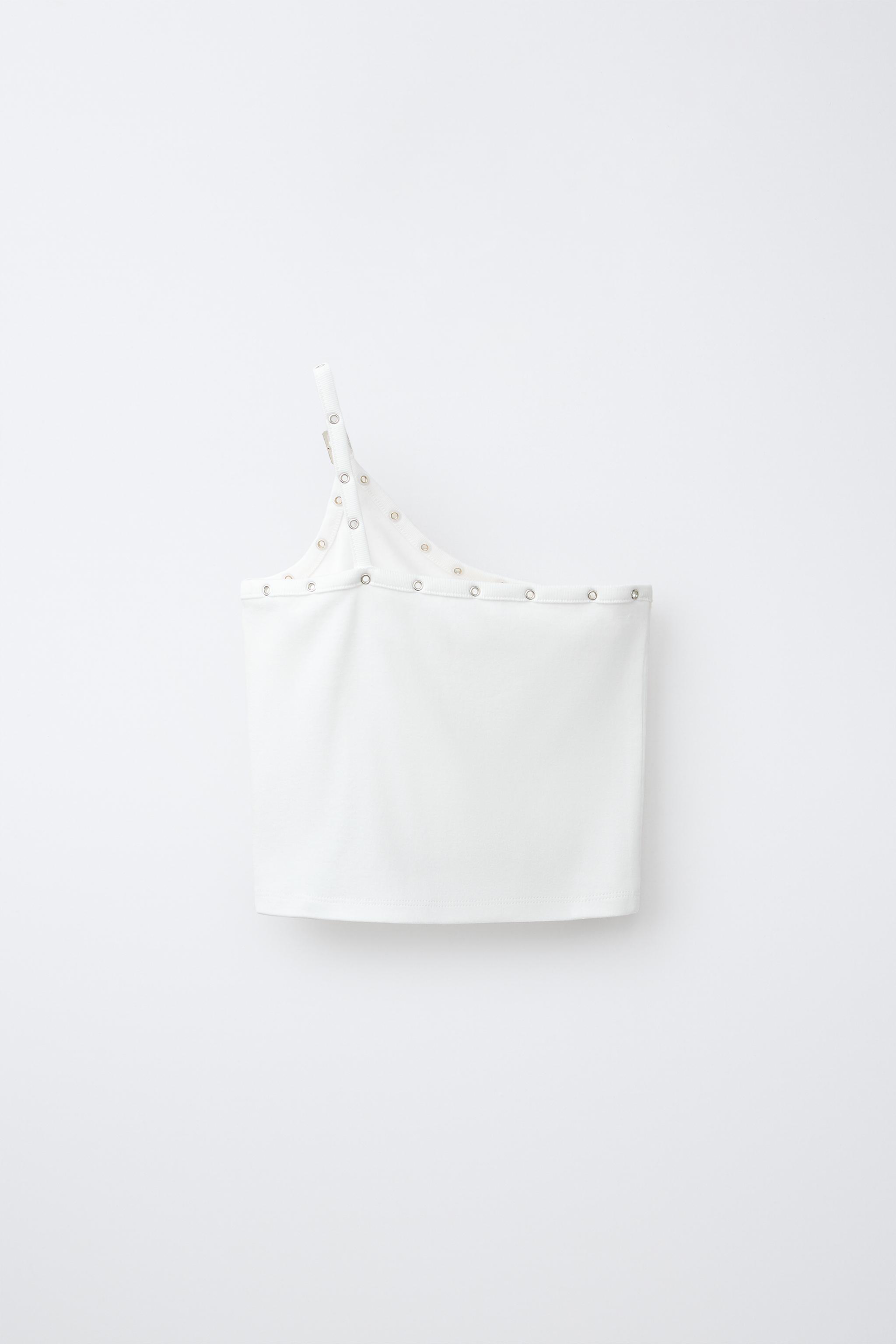 ASYMMETRIC BUCKLE TOP